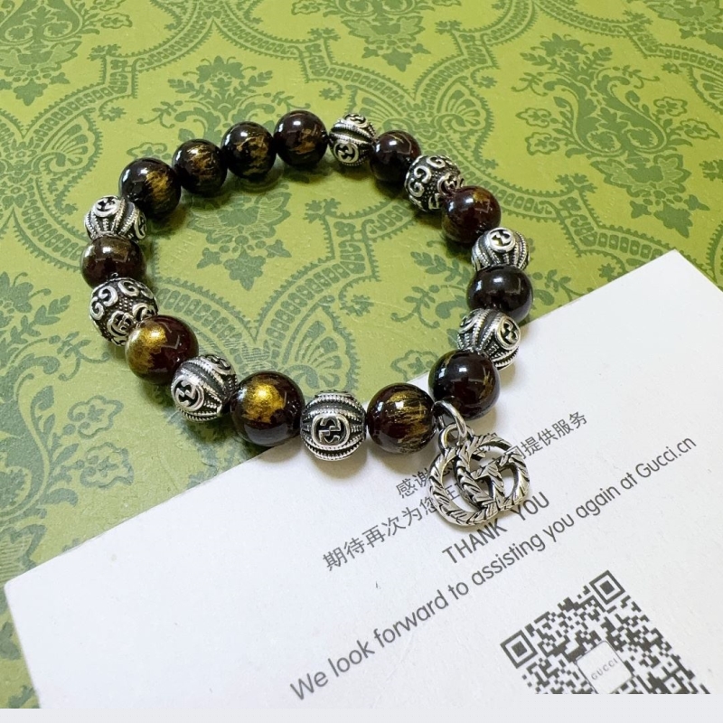G*u*i bracelets